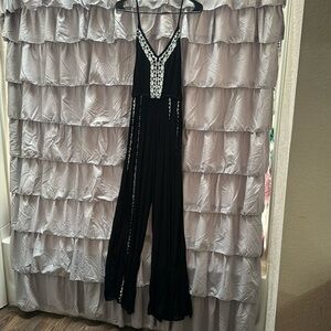 Black romper with white detailing